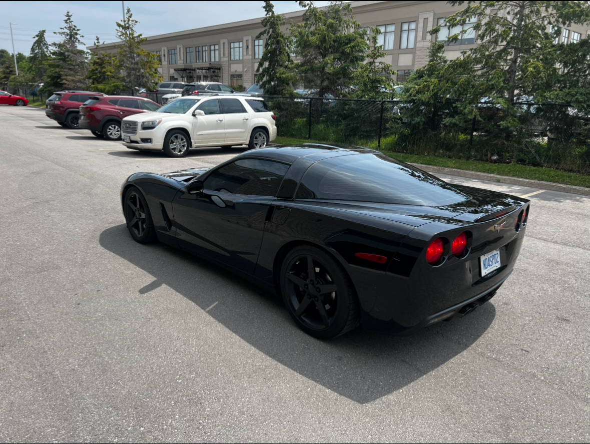 Vehicle in tinting booth